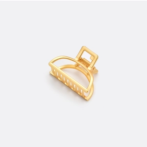 Minimalist matte gold alloy hair claw clip with hollow semicircular design for women