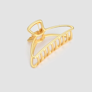 Matte gold alloy hair claw clip with large curved teeth and durable metal spring
