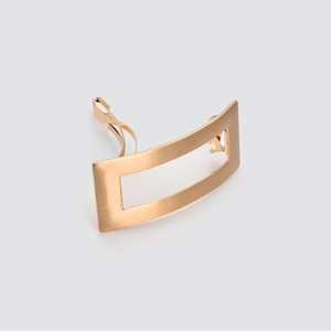 Minimalist matte gold rectangular metal hair clip with a brushed finish for women