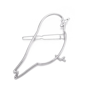 Detailed view of minimalist silver alloy bird-shaped hair clip with sleek hollowed lines