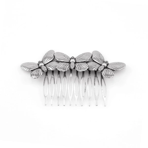 Vintage silver metal hair comb featuring three butterfly ornaments with 8-tooth grip
