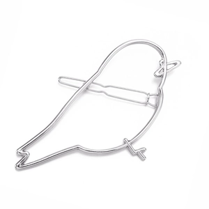 Detailed view of bird-shaped hollow alloy hair clip with silver metallic finish