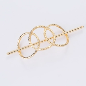 Minimalistischer goldener Haarstab mit hohlen geometrischen Kreisen und Hammerschlag-Finish