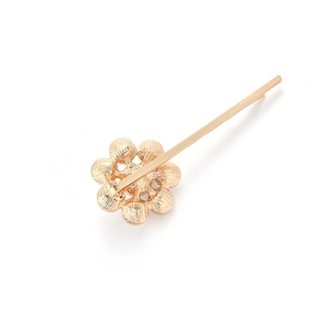 Elegant gold flower hair clip with rhinestones and minimalist circular metal design