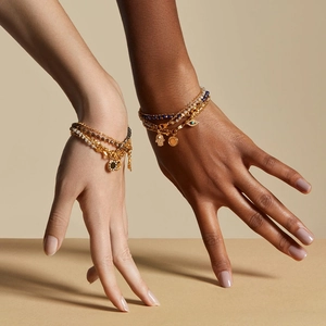 Ensemble de bracelets dorés multicouches avec main de Fatma et charms œil bleu pour femme