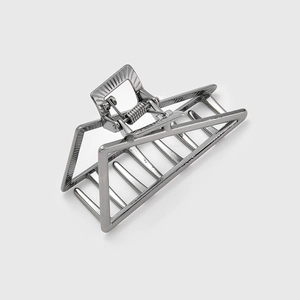 Close-up of a gun black rectangular metal hair claw clip with strong spring and hollow frame