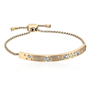 Close-up of gold twist chain bracelet with adjustable slider and sparkling rhinestones