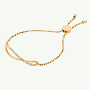 Detail of adjustable gold infinity link bracelet with pavé crystal accents and slider clasp