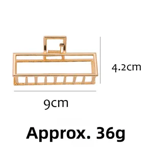 Detailed dimensions of gold metal hair claw clip with 9cm length and hollow rectangle design