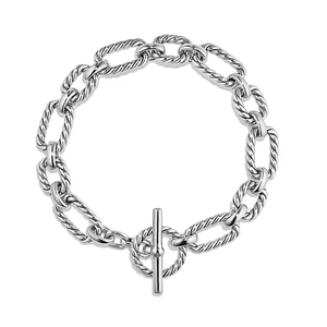 Minimalist silver geometric twist chain bracelet with a functional toggle clasp closure