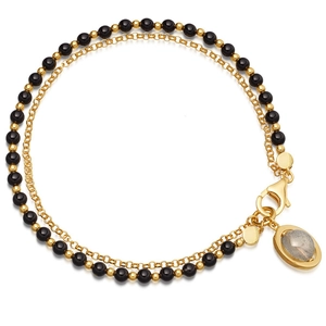 Double-layered beaded bracelet with black agate, golden chain, and grey labradorite pendant