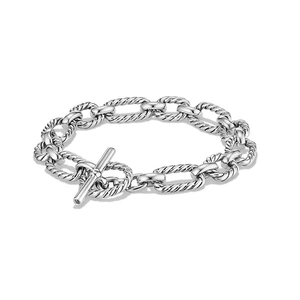Minimalist silver geometric twisted cable link bracelet with a toggle clasp closure