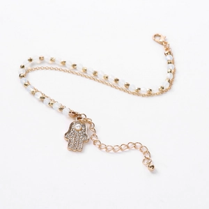 Hamsa Hand layered bracelet with gold beads, crystal accents and adjustable lobster clasp