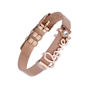 Rose gold mesh bracelet with Love charm and sparkling rhinestone detail on white background