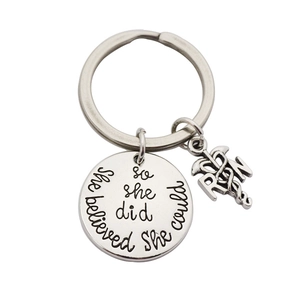 Silver RN Caduceus keychain with She believed she could so she did engraving