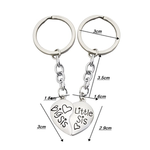 Detailed dimension guide for the Big Sis and Little Sis split heart sister keychain set