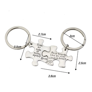 Detailed dimension drawing of puzzle piece keychains showing exact sizes in centimeters