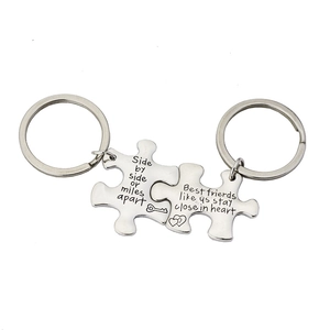 Matching puzzle piece keychain set for best friends or couples in polished silver finish