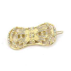 Vintage geometric gold hair clip with sparkling rhinestones and openwork pattern
