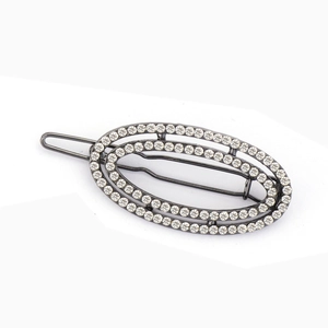 Barrette à cheveux ovale géométrique ornée de strass brillants sur base en alliage