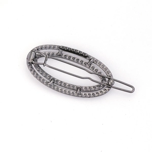 Barrette à cheveux ovale vintage en alliage gris foncé avec cristaux et détails creux