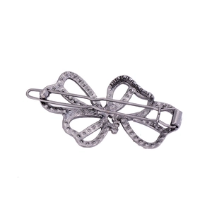 Vintage silver hollow butterfly hair clip made of alloy with textured metallic finish