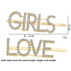 Detalle de horquillas de strass GIRLS y LOVE con especificaciones de 6.3cm y 2cm