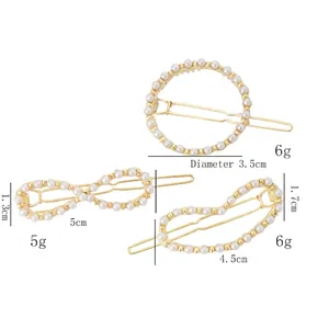 Three-piece minimalist gold pearl hair clip set with geometric circle and infinity shapes