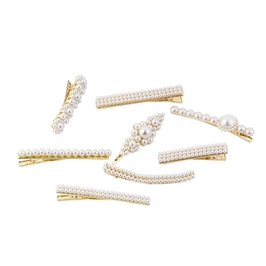 Détails d'un lot de 8 barrettes à cheveux dorées avec perles aux formes élégantes