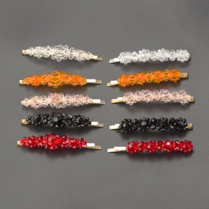 Lot détaillé de 10 barrettes à perles faites main en cinq couleurs sur base dorée