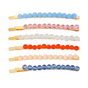 Vue détaillée d'un lot de 6 barrettes en alliage avec des perles colorées et métal doré