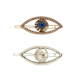 Sparkling crystal evil eye hair clips in gold and silver finish with rhinestone detailing