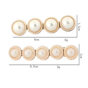 Vue détaillée des pinces à cheveux en perles avec dimensions et poids précises