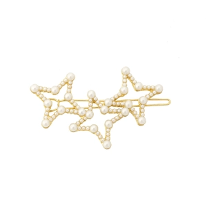 Barrette dorée élégante avec perles blanches et trois motifs d'étoiles superposés