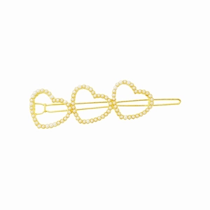 Barrette dorée élégante avec trois motifs de cœur ornés de perles blanches nacrées