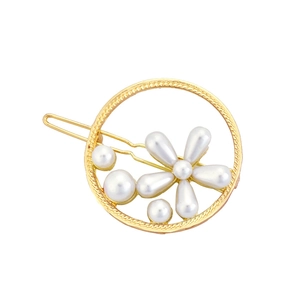 Golden circular alloy hair clip with pearl flower design and snap closure mechanism