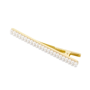 Barrette dorée élégante ornée de deux rangées de perles blanches sur base sobre