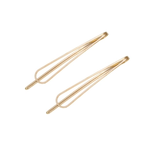 Minimalist gold metal hair clips with geometric teardrop shape and polished finish