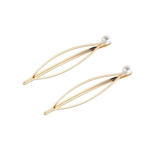 Elegant gold leaf shape hair clips set with white pearls on a clean white background
