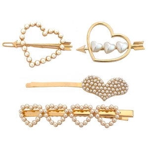 Set of 4 gold heart hair clips with pearls featuring Cupid's arrow and minimalist designs