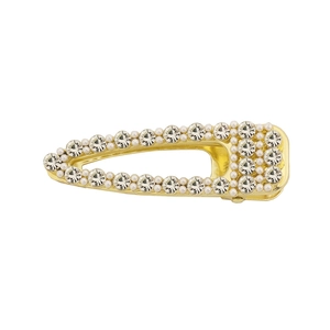 Minimalist gold metal hair clip with pearls and rhinestones on a white background