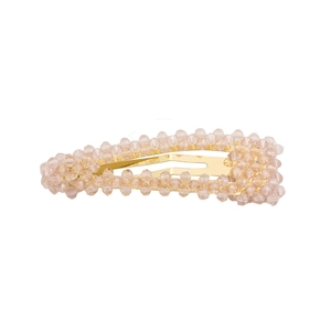 Fermaglio BB classico dorato con perline di cristallo rosa su sfondo bianco