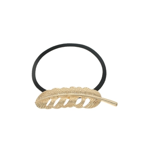 Detailed view of a gold feather alloy hair tie with high-elastic black rubber band