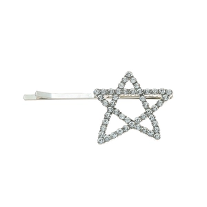 Detail shot of silver alloy star hair clip with sparkling rhinestones on white background