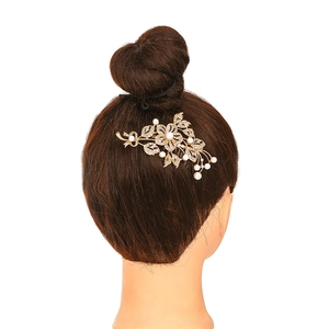 Elegant bridal flower hair comb with pearls and rhinestones on a golden metal base
