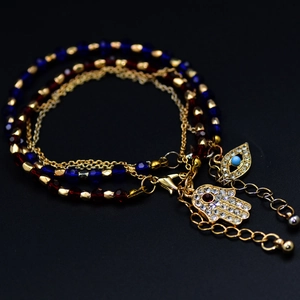 Bohemian multilayer Hamsa and Evil Eye charm bracelet with sparkling glass beads