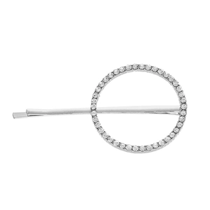 Close-up of silver geometric circle hair clip featuring sparkling white rhinestones