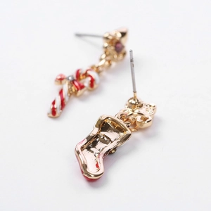Christmas asymmetric stud earrings with gold candy cane and red holiday stocking design