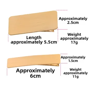 Detailed view of brushed gold metal hair clips with specific size and weight measurements
