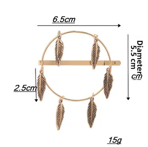 Detailed view of bohemian gold hair clip with six feather charms and size measurements